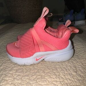 Nike Toddler Sneakers. Believed to be a size 4. Lightly worn.